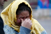 Une femme soutenant l'ex-Premier ministre pakistanais Imran Khan pleure après que celui-ci a été condamné à 10 ans de prison, le 30 janvier 2023 à Rawalpindi, au Pakistan