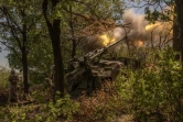 Des artilleurs ukrainiens font feu avec un canon autoporté Caesar de favrication française dans la région de Donetsk (est) le 27 juin 2024
