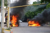 Des véhicules brûlent dans les rues de Culiacan, dans l'état du Sinaloa au Mexique, le 17 octobre 2019