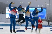 La joie des Français Richard Jouve, Hugo Lapalus, Clément Parisse et Maurice Manificat, après leur médaille de bronze dans le relais 4x10 km aux Jeux olympiques de Pékin, le 13 février 2022 sur le site de ski de fond à Zhangjiakou