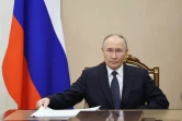 Sur cette photo diffusée par l'agence d'État russe Sputnik, le président russe Vladimir Poutine tient une réunion avant les  pourparlers de paix  avec l'Ukraine, qui se sont tenus à Istanbul, à Moscou, le 14 mai 2025