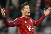 La joie de l'attaquant polonais du Bayern Munich Robert Lewandowski, après avoir marqué à domicile le 3e but face à Salzbourg, en 8e de finale retour de la Ligue des Champions, le 8 mars 2022