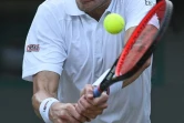 L'Américain John Isner face au Canadien Milos Raonic en quarts de finale de Wimbledon, le 11 juillet 2018