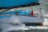Le skipper Thomas Ruyant, à bord de son monocoque (Classe Imoca) "LinkedOut", le 7 novembre 2021 au large des côtes d'Etretat, peu après le départ de la Transat Jacques Vabre depuis le port de Lorient