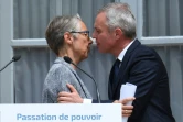 Passation de pouvoirs entre François de Rugy (D) et Elisabeth Borne au ministère de la Transition écologique, le 17 juillet 2019 à Paris