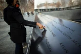 Janice Ryan pointe le nom de son ami décédé pendant le 11-Septembre, au World Trade Center