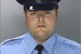 Photo remise par la police de Philadelphie le 8 janvier 2016 montrant le policier Jesse Hartnett, grièvement blessé par un homme se réclamant de l'Etat islamique