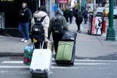 Des migrants, visés par une politique d'accueil plus restrictive de la ville de New York, doivent quitter l'hôtel où ils sont hébergés, le 10 janvier 2024