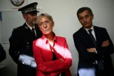 La Première ministre Elisabeth Borne assiste à l'inauguration d'un nouveau commissariat à Paris, en compagnie du ministre de l'Intérieur Gérald Darmanin (D), le 6 septembre 2022