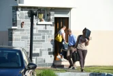 Des enquêteurs quittent la maison d'Albert et Monique Villemin à Aumontzey, le 14 juin 2017