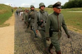 Des passionnés font revivre les affres de Verdun, symbole de la Grande Guerre, le 24 août 2018 à Fort Douaumont, près de Verdun (Meuse)