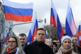 L'opposant russe Alexeï Navalny (c) lors d'une marche en mémoire de l'opposant défunt Boris Nemtsov, dans le centre de Moscou, le 29 février 2020