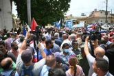 Le président cubain Miguel Diaz-Canel (c) pendant une manifestation, le 11 juillet 2021 à Antonio de Los Banos, à Cuba