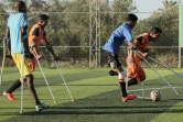 Photo de joueurs d'une équipe palestinienne de football rassemblant des personnes amputées, pour la plupart dans le cadre du conflit avec Israël, prise le 9 juillet 2018 à Deir al Balah, dans la bande de Gaza