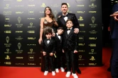 L'attaquant du Paris Saint-Germain, l'Argentin Lionel Messi avec sa femme Antonela Roccuzzo et leurs trois enfants  Ciro, Mateo et Thiago à leur arrivée à la cérémonie du Ballon d'Or France Football 2021 au Théâtre du Châtelet à Paris le 29 novembre 2021 