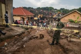 Des maisons touchées par l'effondrement d'une décharge dans un quartier de Kampala, en Ouganda, le 10 août 2024