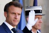 Le président Emmanuel Macron sur le perron de l'Elysée, le 14 juillet 2023 à Paris
