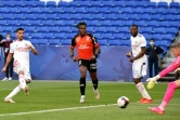 Le milieu de terrain de Lyon, Houssem Aouar, ouvre le score contre Lorient, lors de leur match de L1, le 8 mai 2021 au Groupama Stadium à Décines-Charpieu