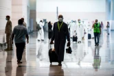 Photo fournie par le ministère saoudien du Hajj, le 25 juillet 2020, un grope de pèlerins arrivant à l'aéroport de Jeddah, en Arabie saoudite