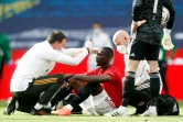 Le défenseur de Manchester United Eric Bailly touché à la tête contre Chelsea en demi-finale de Coupe d'Angleterre, le 19 juillet 2020 au stade de Wembley à Londres