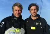 Yann Elies (g) and Charlie Dalin posent à bord de leur monocoque Apivia avant la Transat Jacques Vabre, le 10 octobre 2019 à Port-la-Forêt