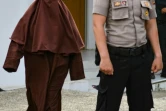 Une recrue d'une nouvelle brigade féminine  chargée de flageller les femmes, à Aceh, en Indonésie, le 10 décembre 2019