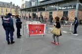 L'entrée d'un marché et contrôle des policiers à Rennes le 21 mars 2020