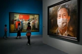 Le portrait de l'expert médical Zhong Nanshan peint par l'artiste Feng Zhaoxie, fait partie de  l'exposition "l'Union fait la force" dédiée au combat des contre le Covid-19, présentée au musée national de Chine à Pékin, le 5 août 2020