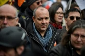 Le secrétaire général de la CFDT Laurent Berger (C), le 28 mars 2023 lors d'une manifestation contre la réforme des retraites à Paris