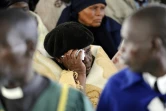 Une femme  en larmes le 23 août 2012 lors d'une cérémonie d'hommage aux personnes tuées lors de la répression policière d'une manifestation de mineurs à Marikana (Afrique su Sud) le 16 août