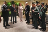 Le ministre chinois de la Défense Wei Fenghe (4ème à partir de la D) et le secrétaire américain à la Défense Lloyd Austin (G) au sommet sur la sécurité en Asie-Pacifique, le 11 juin 2022 à Singapour