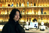 Kentaro Yoshifuji, fondateur du café Dawn et de la société Ory Laboratory,  pose au café Dawn à Tokyo, le 17 août 2021
