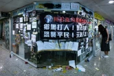 Des affiches placardées par des manifestants sur la permanence d'un député pro-Pékin, à Hong Kong le 22 juillet 2019 