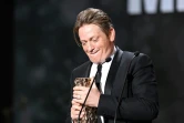 L'acteur français Benoit Magimel après avoir reçu le prix du meilleur acteur pour le film "De Son Vivant" lors de la 47ème édition de la cérémonie des César  à Paris le 25 février 2022