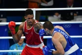 Le Français Tony Yoka (g) face au Croate Filip Hrgovic en demi-finale des +91 kg lors du tournoi olympique de boxe à Rio, le 19 août 2016