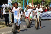 1.8 kilometre de course derrière un pneu, à Mamoudzou dans le nord-est de Mayotte le 19 juin 2019