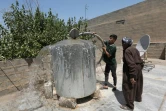 Distribution d'eau à Erbil, capitale du Kurdistan autonome dans le nord de l'Irak, qui souffre d'une pénurie d'eau courante, le 25 juillet 2024