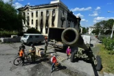 Distribution d'aide humanitaire à Lyssytchansk, ville occupée par l'armée russe,  le 12 juillet 2022 dans l'est de l'Ukraine