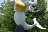 One of two mermaid statues covered up at the Ancol amusement park in Jakarta