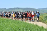 Le coureur britannique Russ Cook () lors de la dernière étape d'un périple de plus de 16.000km, le 7 avril 2024 à Cap Angela, dans le nord de la Tunisie 