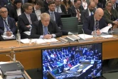 L'ancien Premier ministre britannique Bloris Johnson (c) lors de son audition devant une commission parlementaire, le 22 mars 2023 à Londres