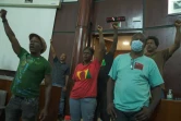 Capture d'image tirée d'une vidéo de l'AFPTV montrant des personnes en train de manifester en pleine séance du Conseil régional de la Guadeloupe, le 23 décembre 2021