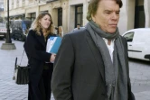 Bernard Tapie à son arrivée au pôle financier du tribunal de grande instance le 12 mars 2015 à Paris