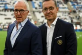 Le propriétaire de l'Olympique de Marseille, l'Américain Frank McCourt (g), et son président Jacques-Henri Eyraud, avant le match de Ligue 1 face à Montpellier, au Vélodrome, le 24 mai 2019