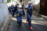 Des femmes courent dans les rues de Jeddah, en abaya sportive, le 8 mars 2018