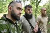 (g-d) Mansour (c), Islam (g) et Asadulla,  combattants du bataillon Cheikh Mansour, le 9 juin 2022 à Zaporijjia, en Ukraine