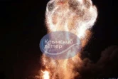 Photo publiée sur la chaîne Telegram @VentdeCrimee, le 26 décembre 2023, montrant une explosion après une attaque ukrainienne dans le port de Feodosiya, en Crimée sous contrôle russe