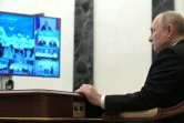 Le président russe Vladimir Poutine en visioconférence avec les membres de l'équipe russe paralympique avant les jeux de Pékin, le 21 février 2022 à Moscou