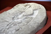 Détail d'un autel vieux de 1.500 ans récemment découvert sur un site archéologique du nord du Guatemala, au musée d'archéologie et d'ethnologie de Guatemala city, le 12 septembre 2018