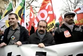 Les secrétaires généraux de la FSU Benoît Teste (G) et de la CGT Philippe Martinez (C) lors d'une manifestation à Paris le 11 janvier 2020 contre le projet de réforme des retraites